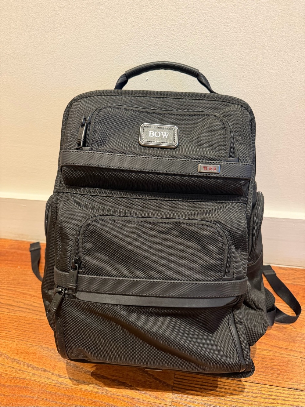 Tumi Black Backpack with Multiple Front Pockets